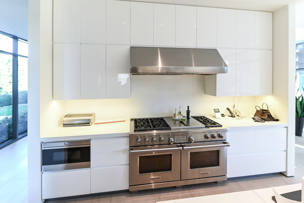 Custom Modern White Gloss Kitchen with Island, Stone Countertops and 60" Wolf Range