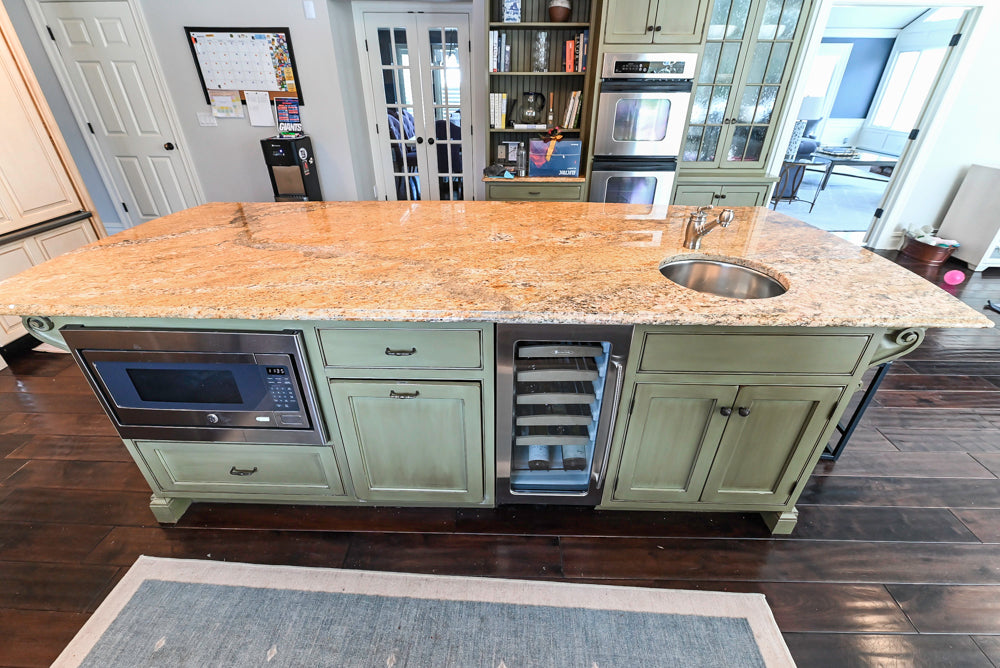 ÒThe HarcourtÓ Traditional Two-Tone Distressed Kitchen with Green Island, Granite Countertops and Appliances