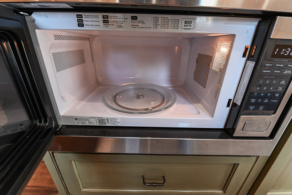 ÒThe HarcourtÓ Traditional Two-Tone Distressed Kitchen with Green Island, Granite Countertops and Appliances