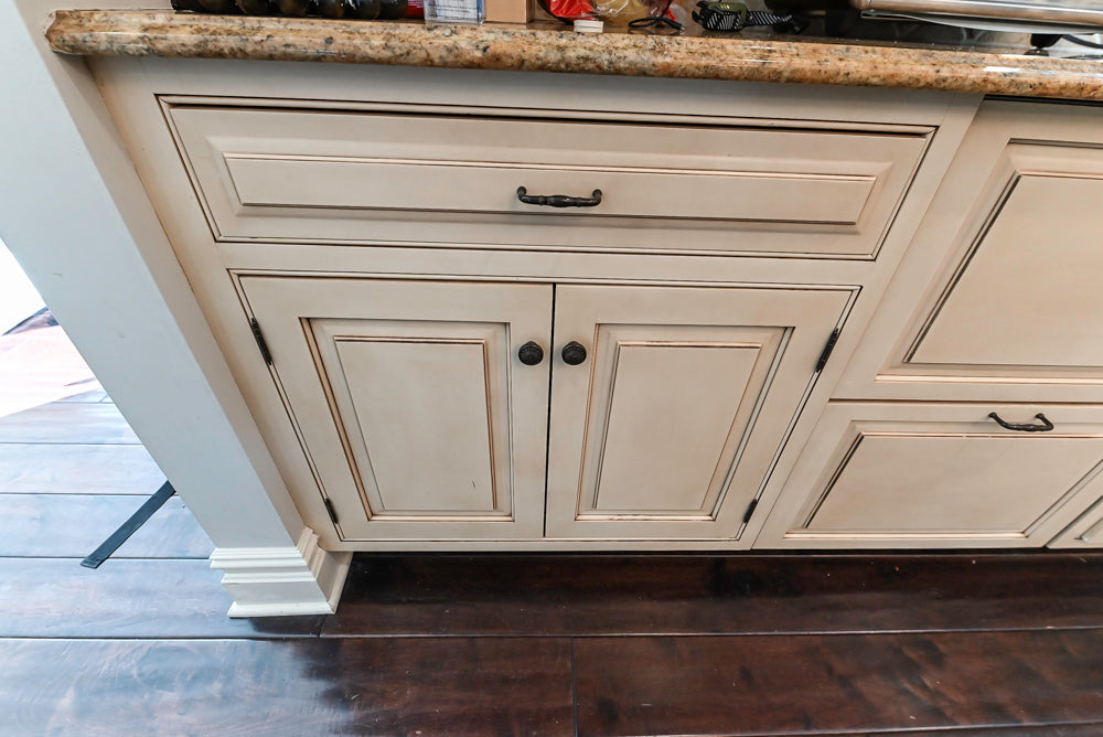 ÒThe HarcourtÓ Traditional Two-Tone Distressed Kitchen with Green Island, Granite Countertops and Appliances