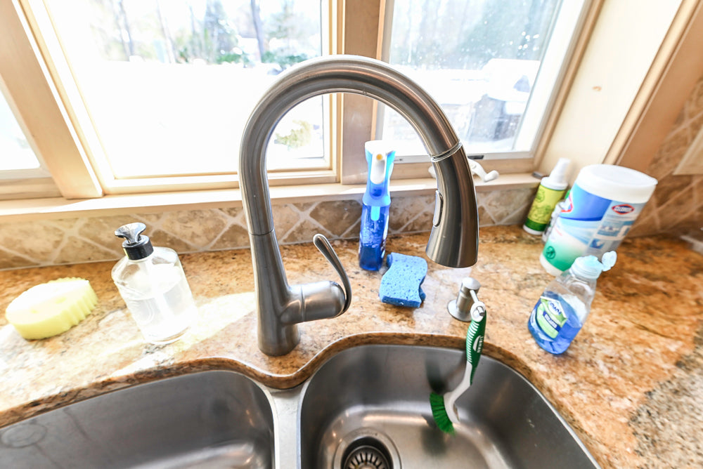 ÒThe HarcourtÓ Traditional Two-Tone Distressed Kitchen with Green Island, Granite Countertops and Appliances