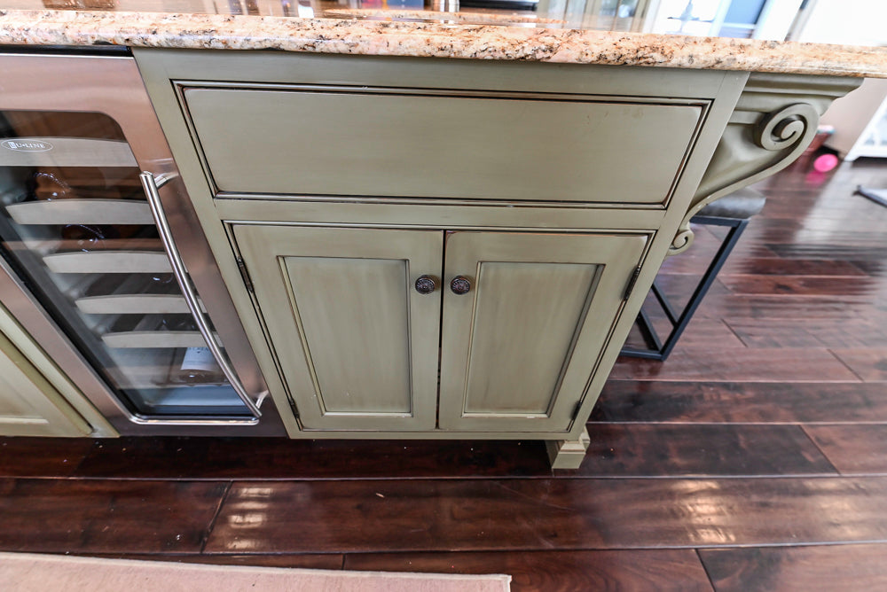 ÒThe HarcourtÓ Traditional Two-Tone Distressed Kitchen with Green Island, Granite Countertops and Appliances