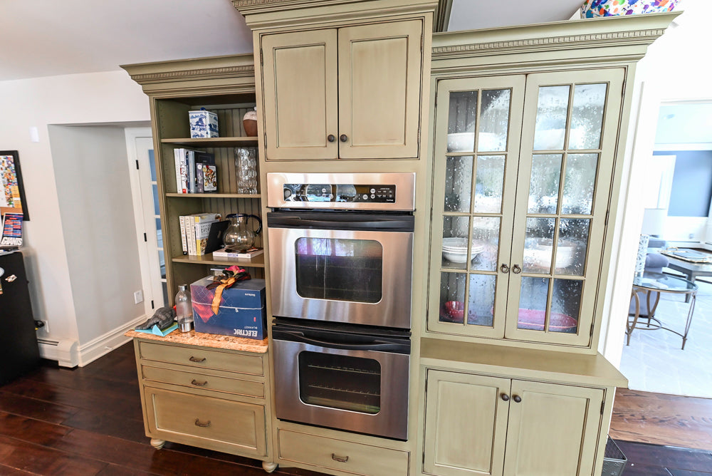 ÒThe HarcourtÓ Traditional Two-Tone Distressed Kitchen with Green Island, Granite Countertops and Appliances