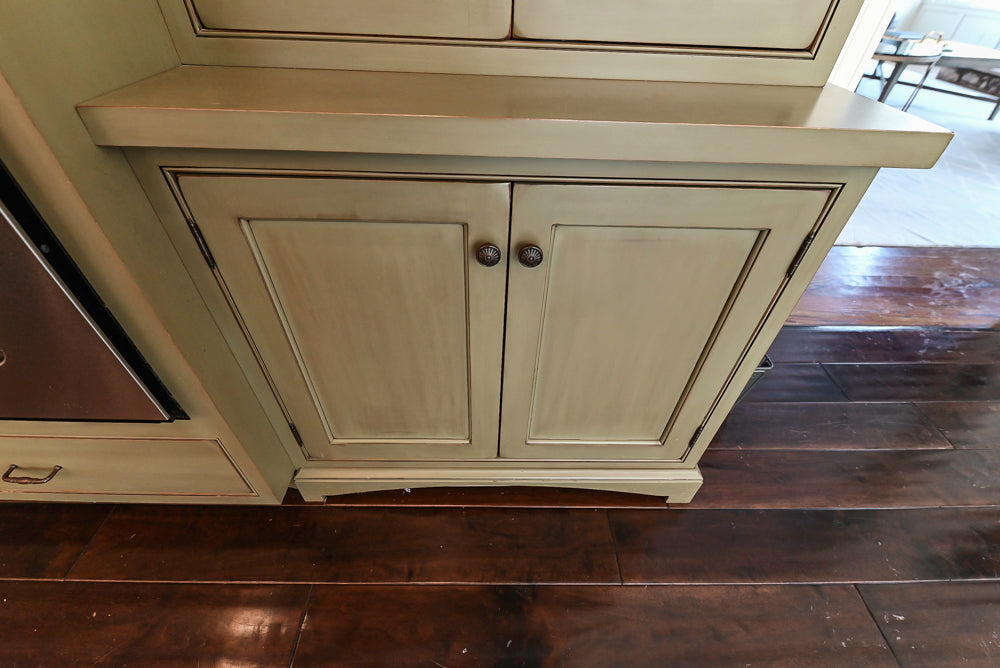 ÒThe HarcourtÓ Traditional Two-Tone Distressed Kitchen with Green Island, Granite Countertops and Appliances