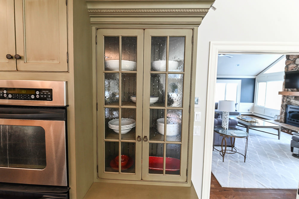 ÒThe HarcourtÓ Traditional Two-Tone Distressed Kitchen with Green Island, Granite Countertops and Appliances