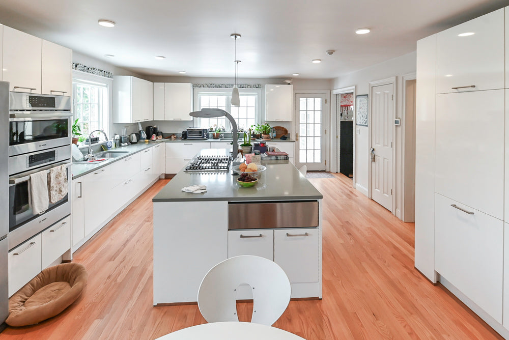Nobilia Modern White Kitchen with Grey Stone Countertops, Island and Bosch Appliances
