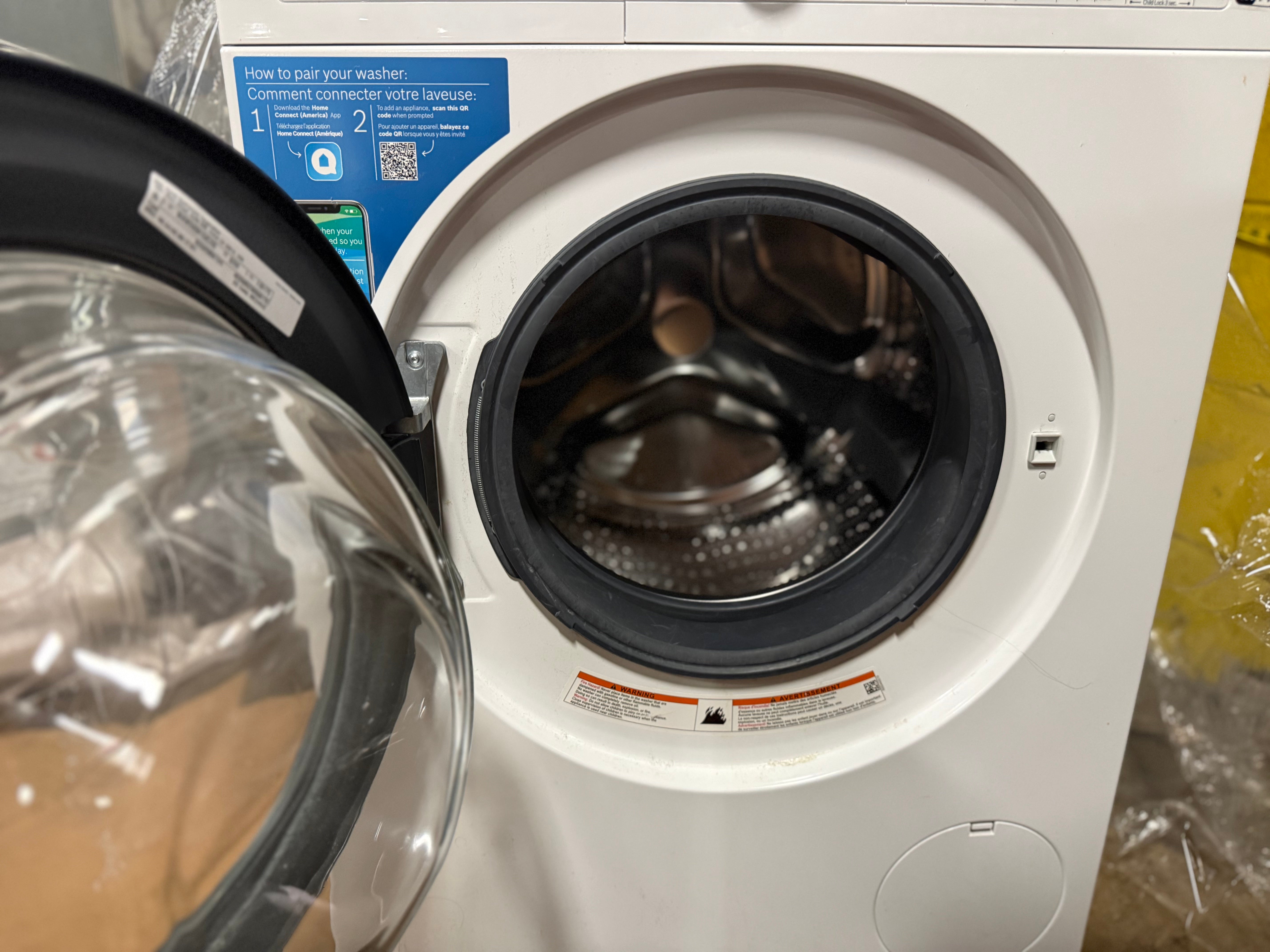 Bosch 500 Series 24" White Stacked Washer & Electric Dryer