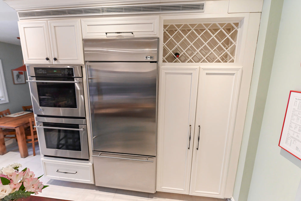 Candelight Traditional Off White Kitchen with Island and Monogram Appliances