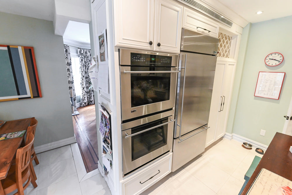 Candelight Traditional Off White Kitchen with Island and Monogram Appliances