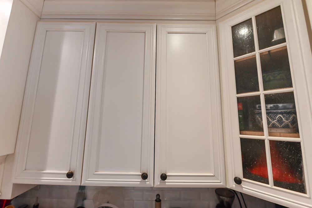 Candelight Traditional Off White Kitchen with Island and Monogram Appliances