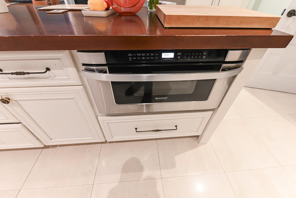 Candelight Traditional Off White Kitchen with Island and Monogram Appliances