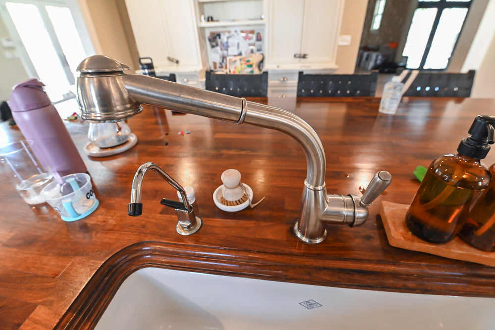 Plain & Fancy Traditional White Kitchen with Island, Marble Countertops & Appliances