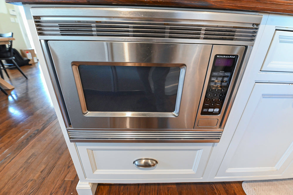 Plain & Fancy Traditional White Kitchen with Island, Marble Countertops & Appliances