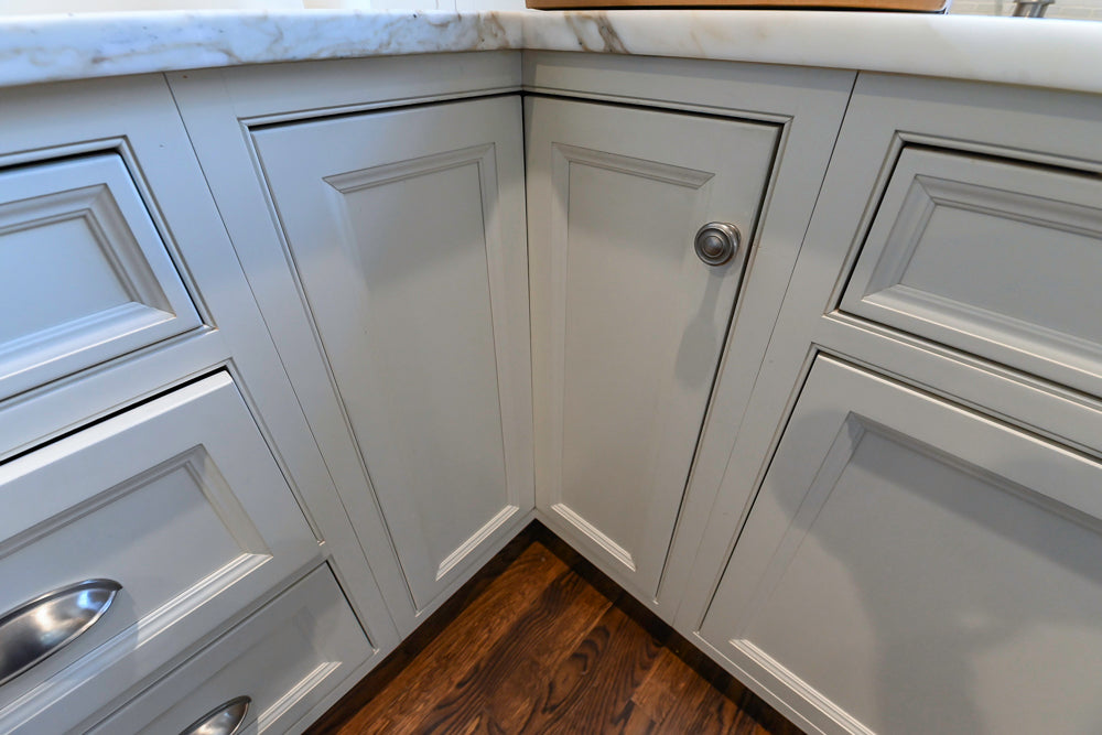 Plain & Fancy Traditional White Kitchen with Island, Marble Countertops & Appliances