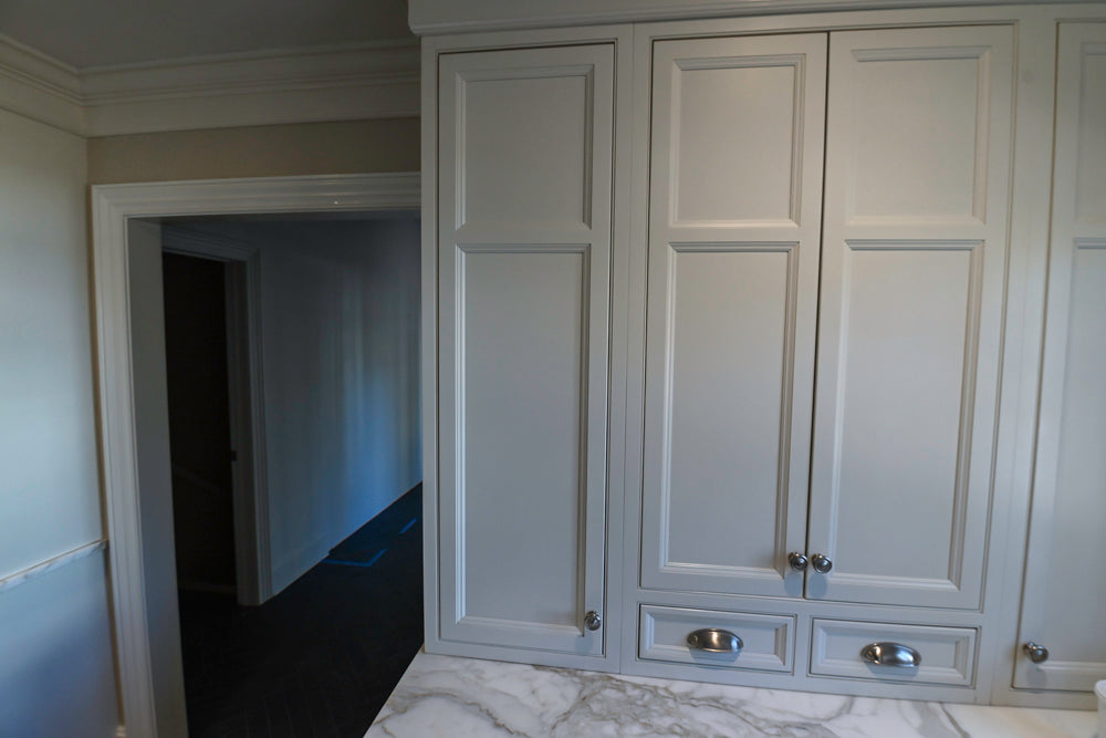 Plain & Fancy Traditional White Kitchen with Island, Marble Countertops & Appliances