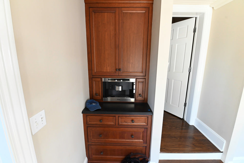 Plain & Fancy traditional wooden side pantry with integrated Miele coffee machine