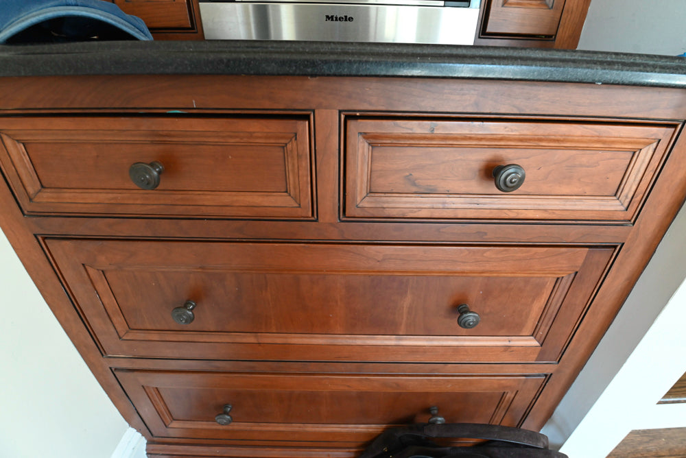 Custom 36 inch side pantry by Plain & Fancy with professional Miele coffee unit