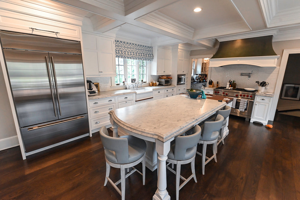 Complete architectural kitchen set with island and integrated premium appliance