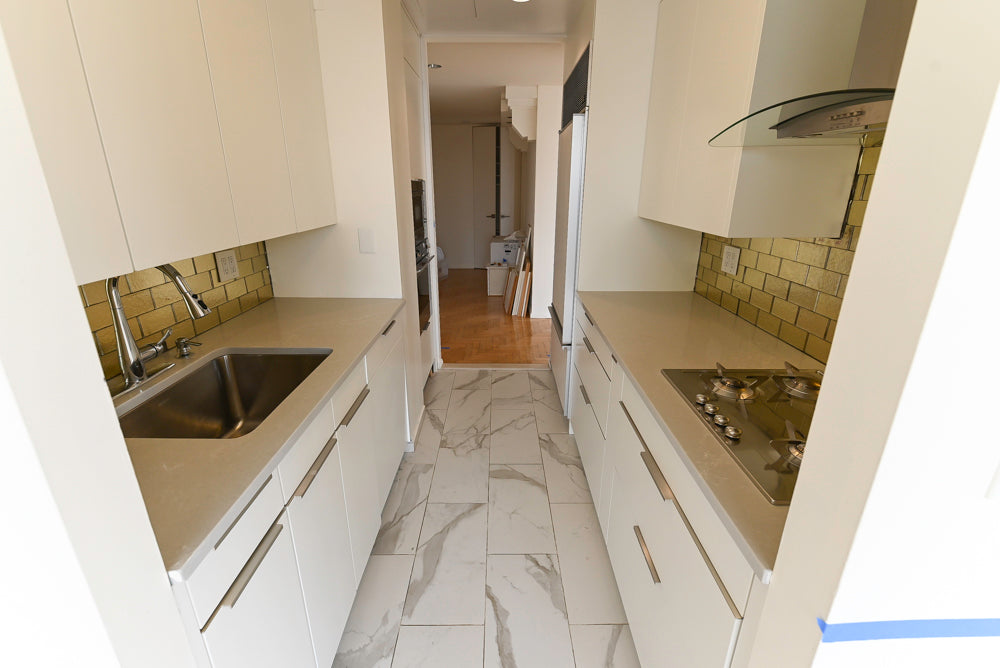 Luxury compact kitchen set featuring German-engineered Leicht cabinets and Smeg appliances