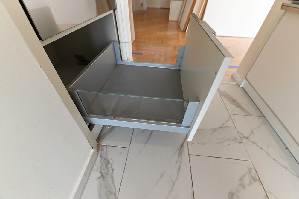 Leicht Modern Off White Kitchenette with Quartz Countertops & Smeg Appliances