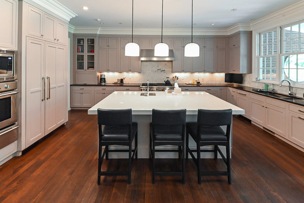 Plain and Fancy custom transitional kitchen suite front view in Repose Gray with Thermador appliances