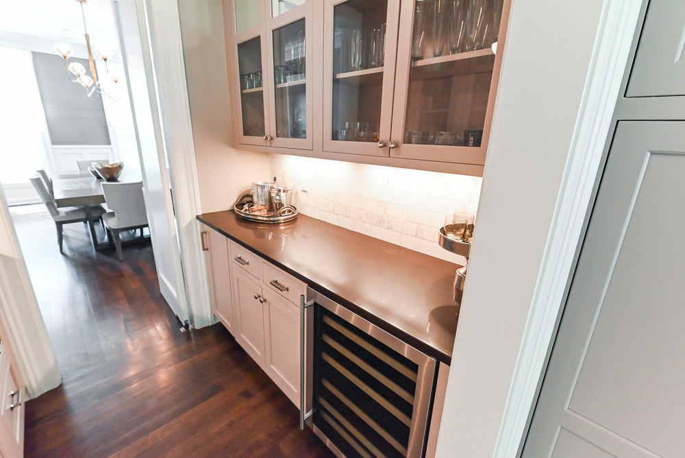Pre owned Plain and Fancy luxury butler pantry holding built in ice maker and wine cooler