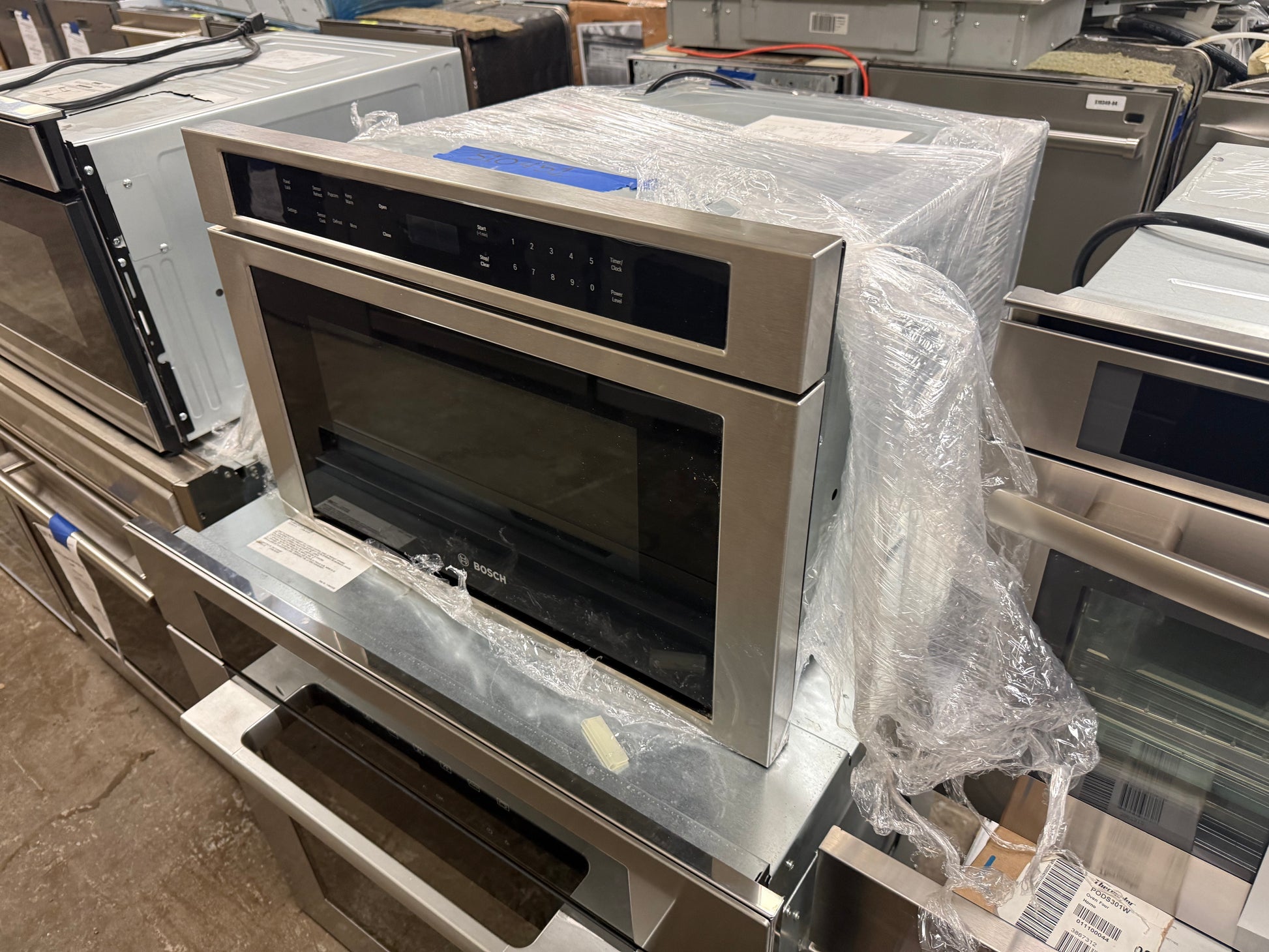 Bosch HMD8451UC 800 Series 24 inch built in microwave drawer front view stainless steel