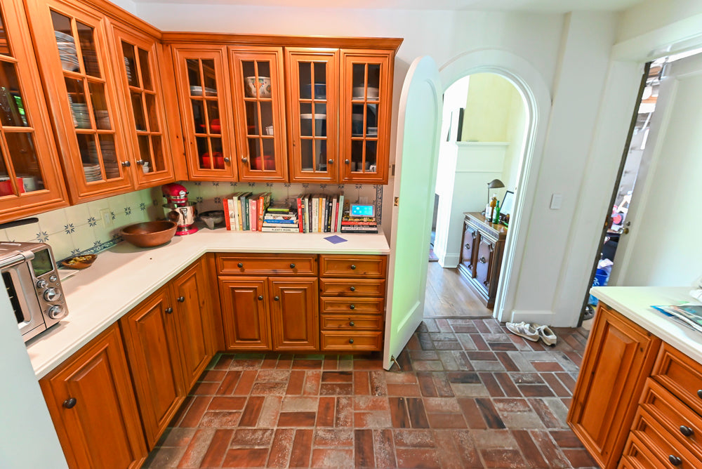 Luxury inset cabinetry butler's pantry with prep sink by Wood-Mode