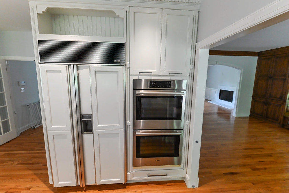 "The Montgomery" Transitional White Kitchen with Blue Island & Appliances