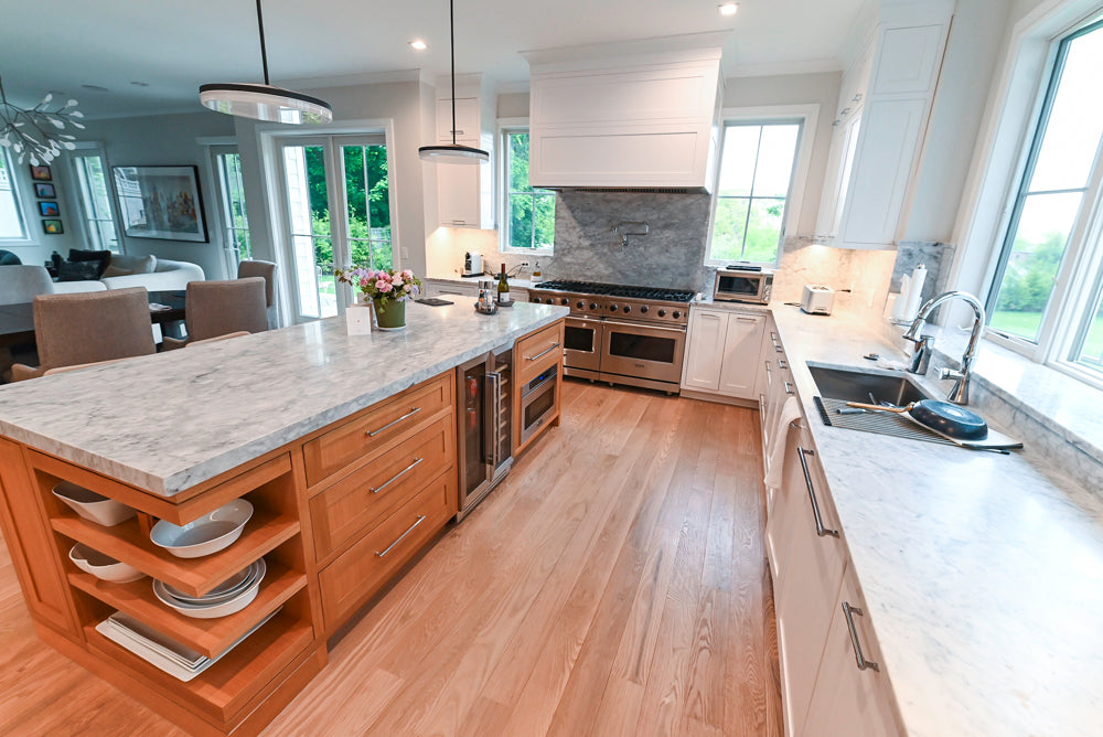 Pre owned custom white oak kitchen island with open shelving and deep pot drawers