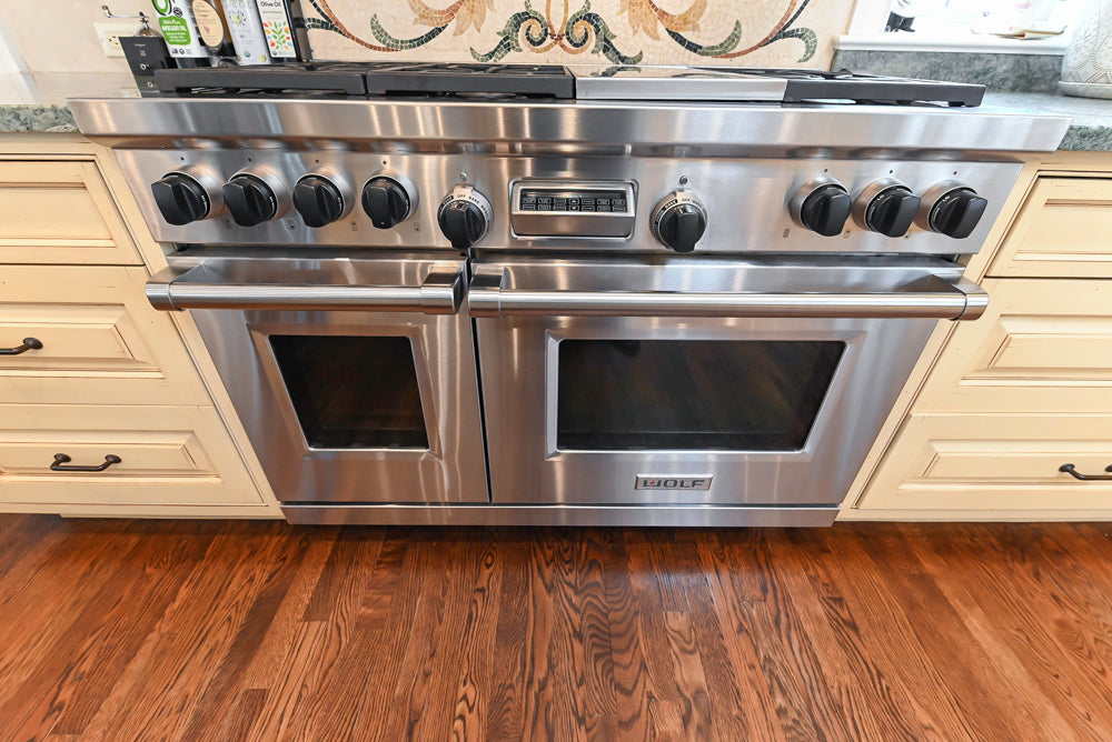 Woodcraft Traditional Light Yellow Kitchen with Island & 48" Wolf Range