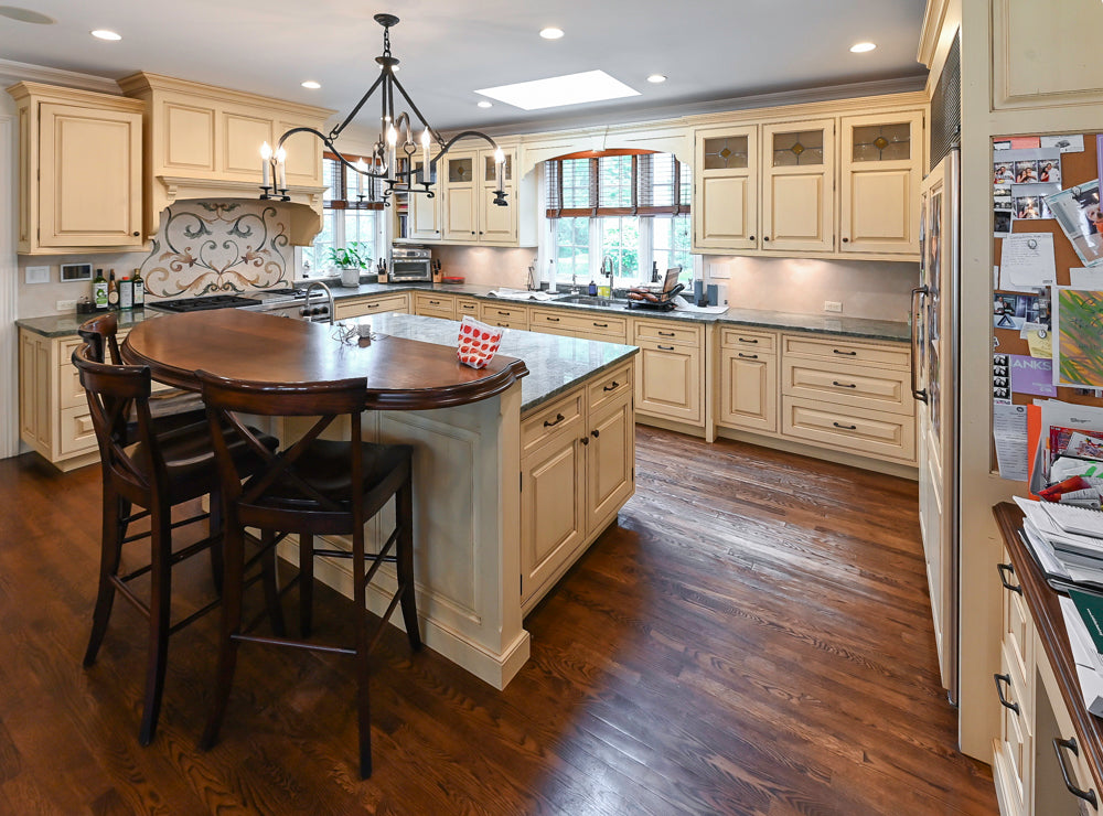 Woodcraft Traditional Light Yellow Kitchen with Island & 48" Wolf Range