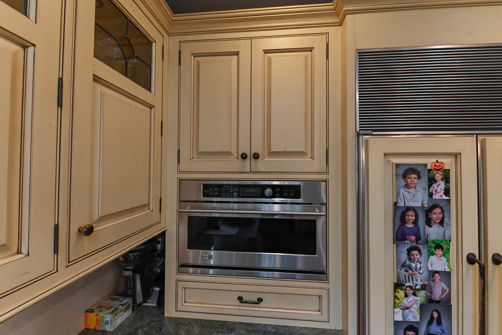 Woodcraft Traditional Light Yellow Kitchen with Island & 48" Wolf Range
