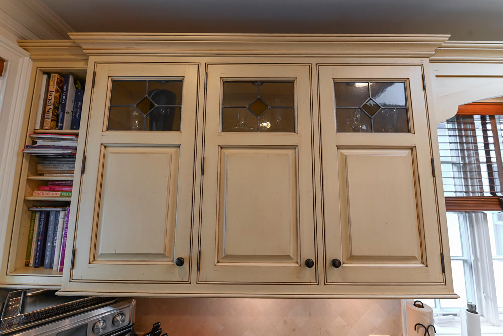 Woodcraft Traditional Light Yellow Kitchen with Island & 48" Wolf Range