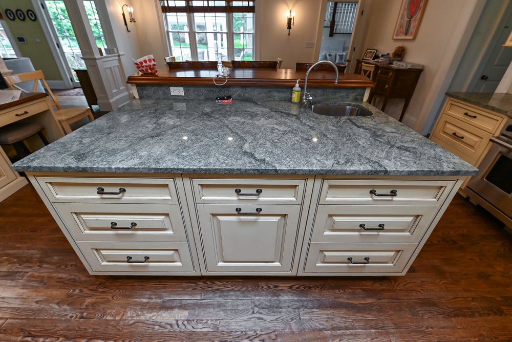 Woodcraft Traditional Light Yellow Kitchen with Island & 48" Wolf Range