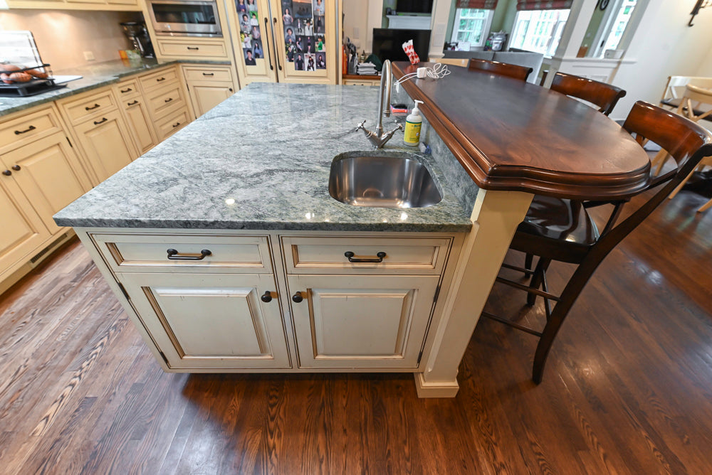 Woodcraft Traditional Light Yellow Kitchen with Island & 48" Wolf Range
