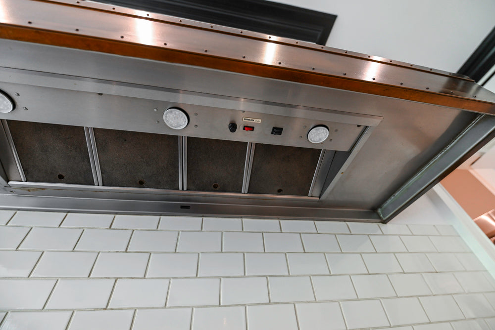 "The Dove" Transitional White Kitchen with Wolf 60" Range & Sub-Zero