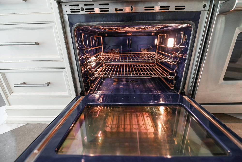 "The Dove" Transitional White Kitchen with Wolf 60" Range & Sub-Zero