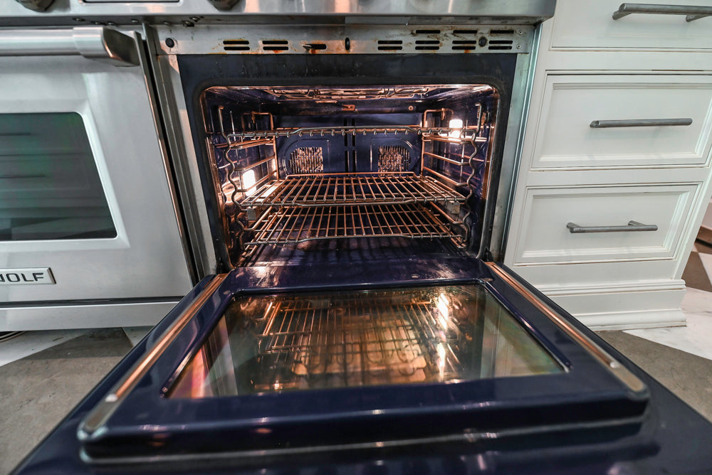 "The Dove" Transitional White Kitchen with Wolf 60" Range & Sub-Zero