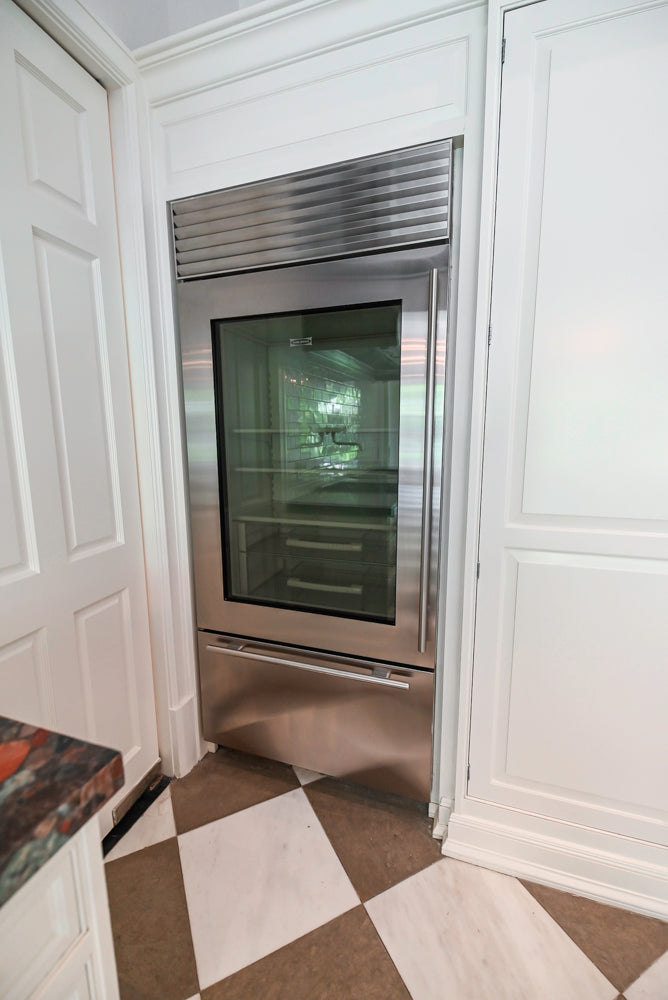 "The Dove" Transitional White Kitchen with Wolf 60" Range & Sub-Zero