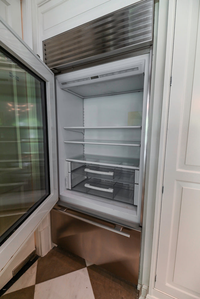 "The Dove" Transitional White Kitchen with Wolf 60" Range & Sub-Zero