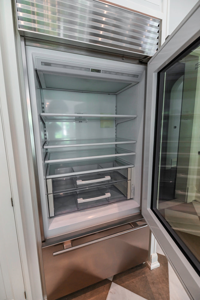 "The Dove" Transitional White Kitchen with Wolf 60" Range & Sub-Zero
