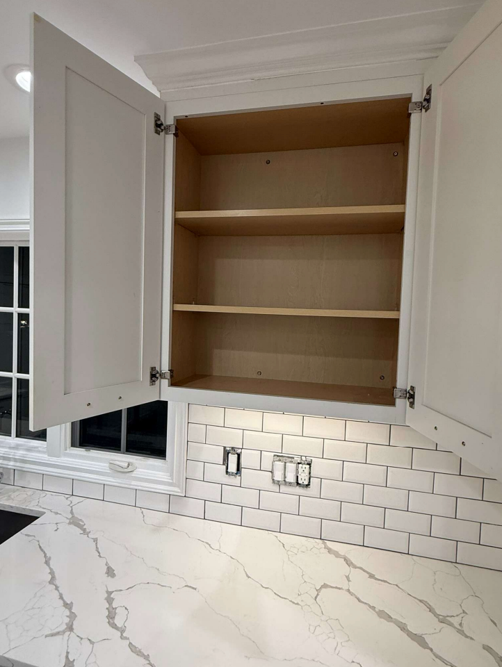 ÒThe WesterlyÓ Transitional White Kitchen with Island, 48" Sub-Zero Refrigerator and Bosch Appliances