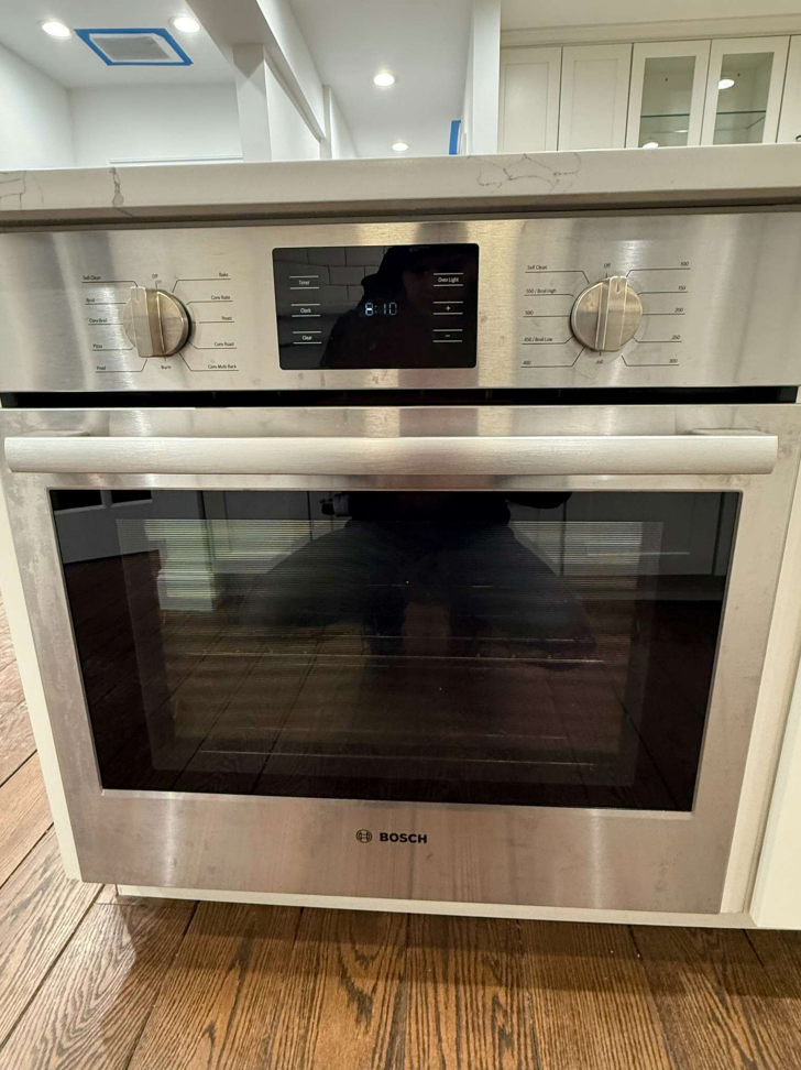 ÒThe WesterlyÓ Transitional White Kitchen with Island, 48" Sub-Zero Refrigerator and Bosch Appliances