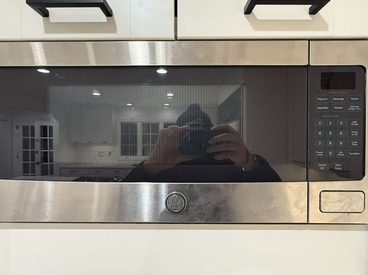 ÒThe WesterlyÓ Transitional White Kitchen with Island, 48" Sub-Zero Refrigerator and Bosch Appliances