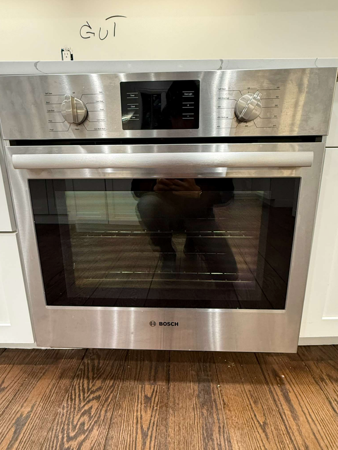 ÒThe WesterlyÓ Transitional White Kitchen with Island, 48" Sub-Zero Refrigerator and Bosch Appliances
