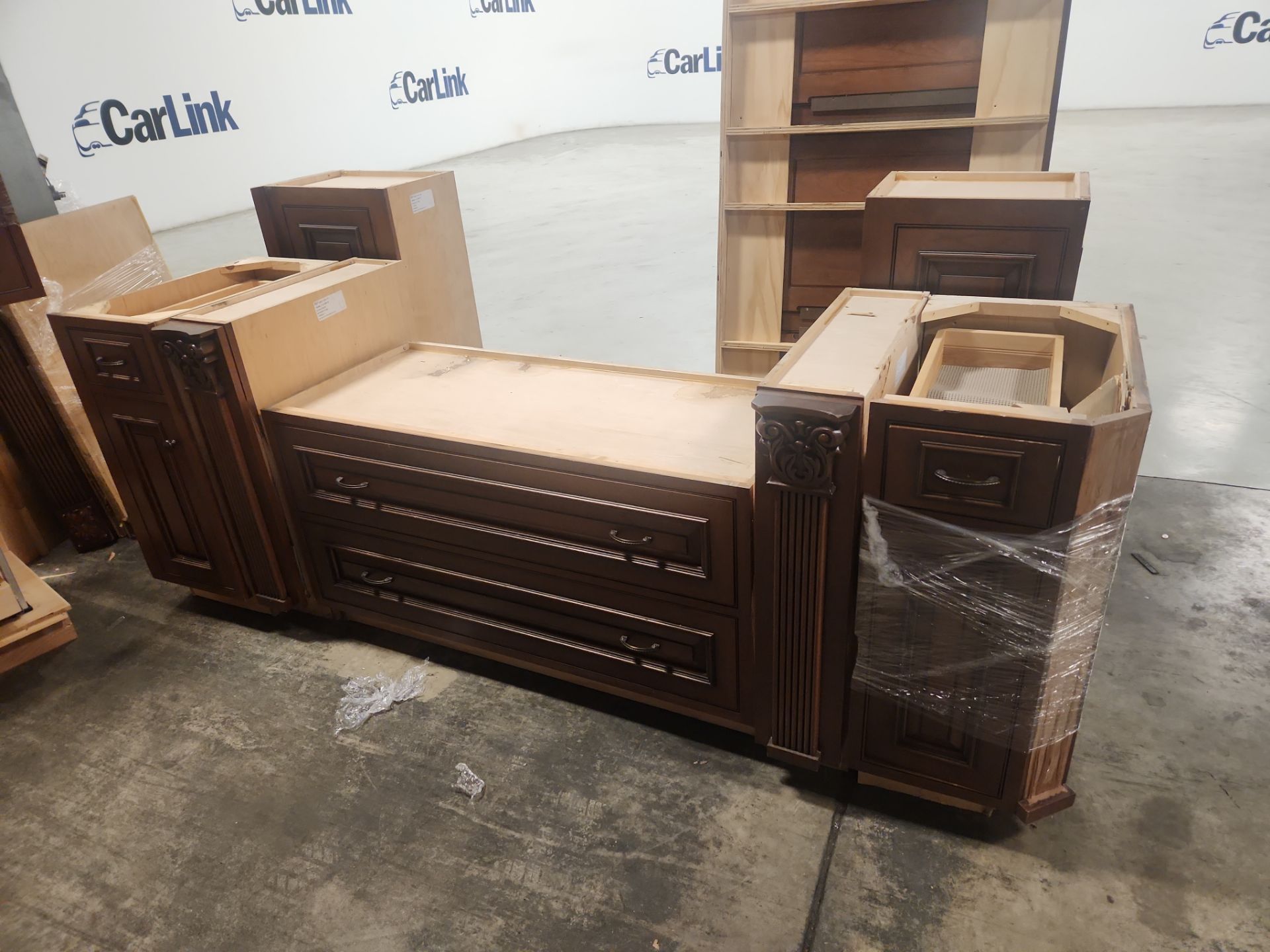 The Marbury traditional wooden partial kitchen cabinets in natural wood finish