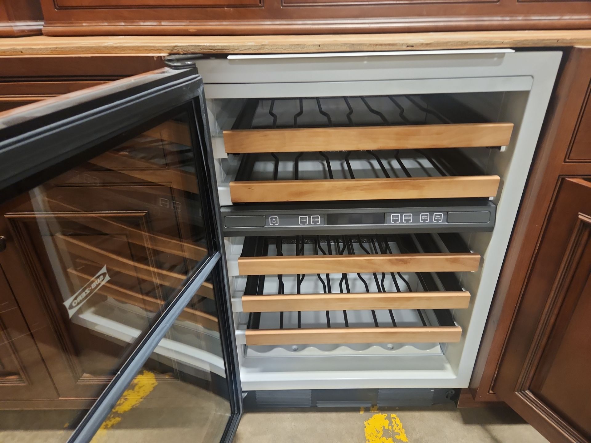 ÒThe ReserveÓ Custom Traditional Wood Butler's Pantry with Sub-Zero Wine Cooler