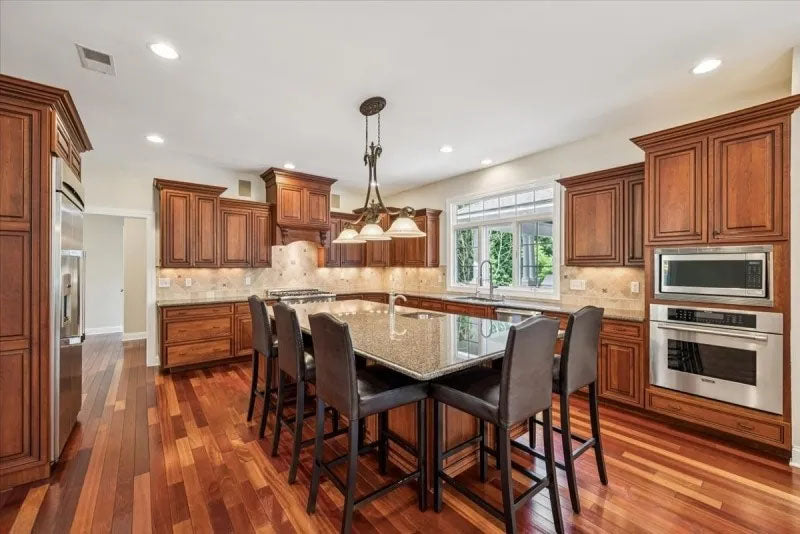 Pennville Traditional Wooden Kitchen with Granite Countertops and Thermador Appliances