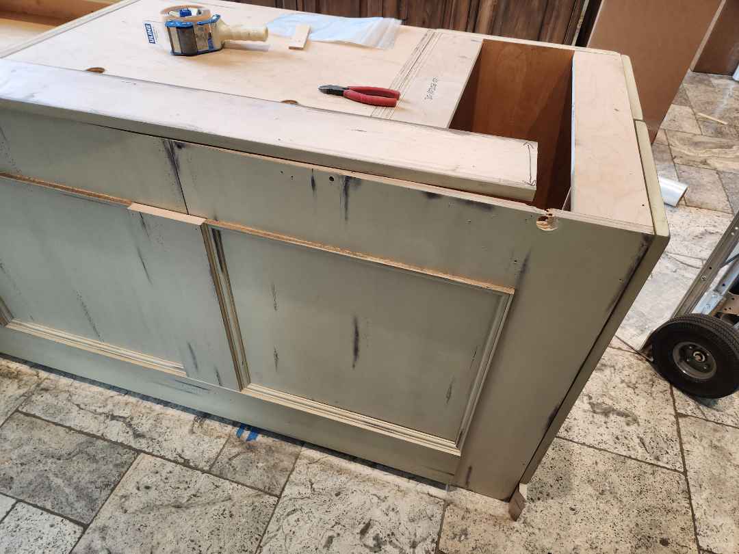 Custom Traditional Distressed Two-Tone Kitchen with Double Island, Stone Countertops and Sub-Zero & Wolf Appliances